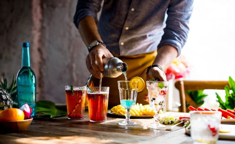 Bartender guy working prepare cocktail skills